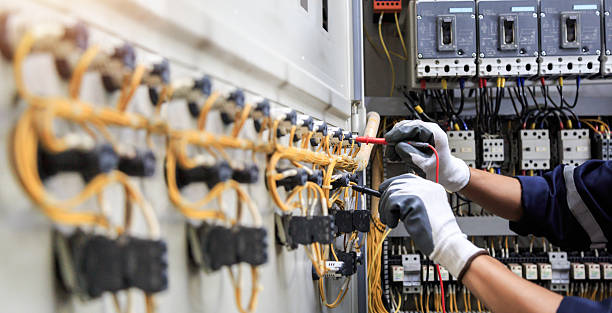 Professional Electrician technician working in Auburn, AL